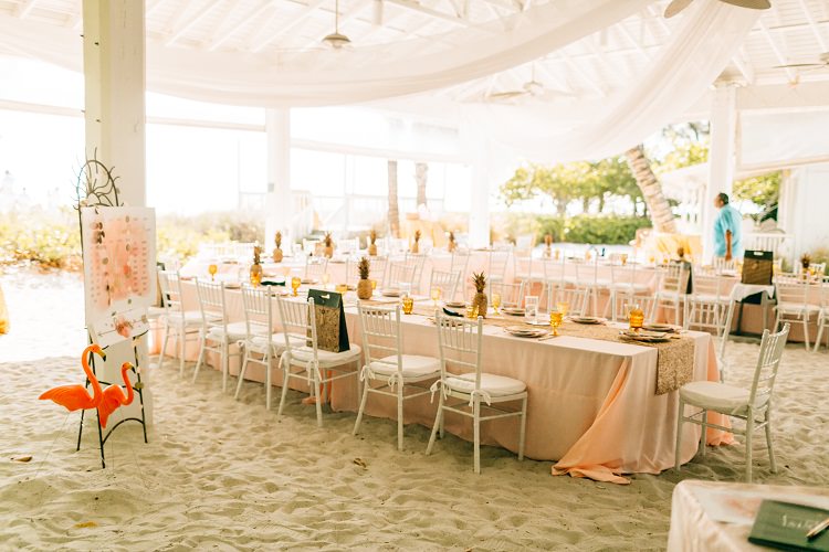 Tablescape Beach Table Plan Pink Gold Flamingos Pineapples Florida Destination Wedding http://www.findinglightphotography.com/