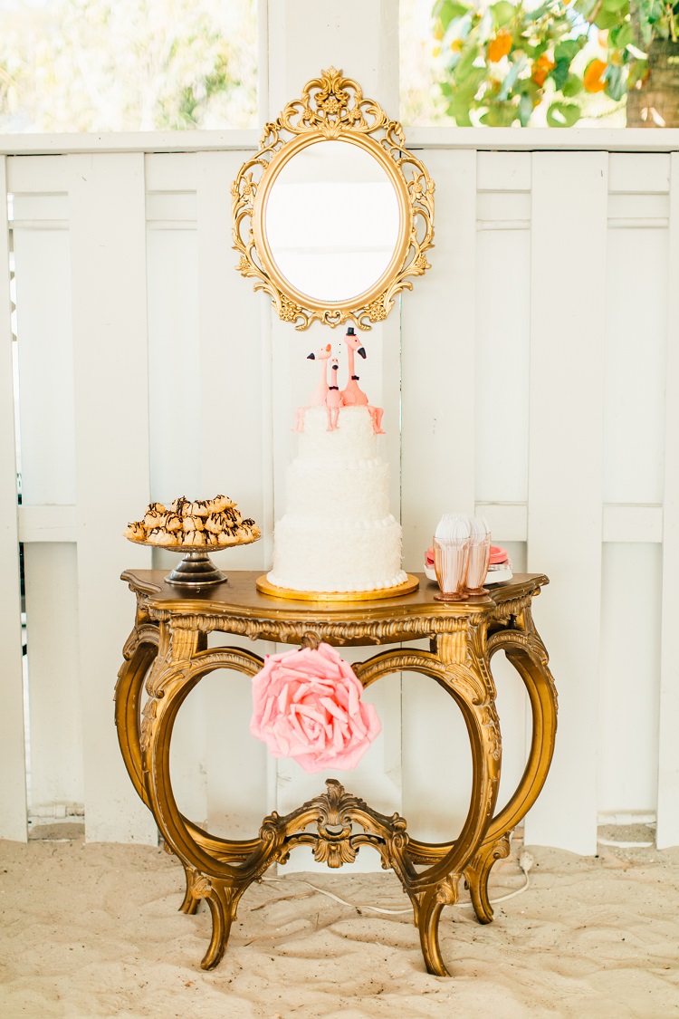 Cake Table Mirror Paper Pom Pom Coconut Tiered Pink Gold Flamingos Pineapples Florida Destination Wedding http://www.findinglightphotography.com/