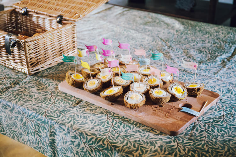 Canapes Scotch Eggs Flags Cocktail Sticks Relaxed Bohemian Spring Barn Wedding http://emilytylerphotography.com/