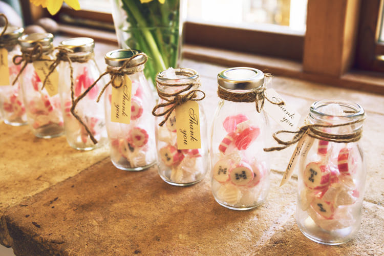 Favours Thank You Milk Bottle Twine Luggage Tag Rock Candy Sweets Relaxed Bohemian Spring Barn Wedding http://emilytylerphotography.com/