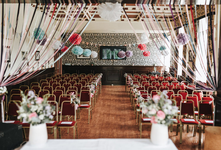 Ceremony Ribbon Backdrop Curtain Pom Poms Crafty Fun Budget Friendly Wedding https://www.pearbearphotography.com/
