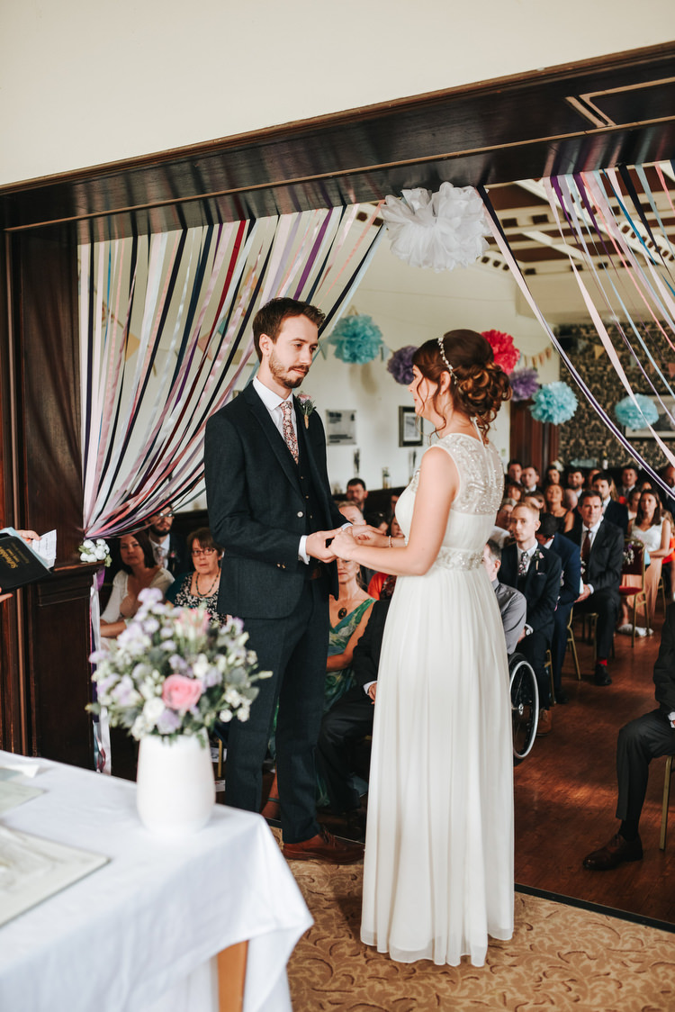 Ribbon Curtain Backdrop Ceremony Pom Crafty Fun Budget Friendly Wedding https://www.pearbearphotography.com/