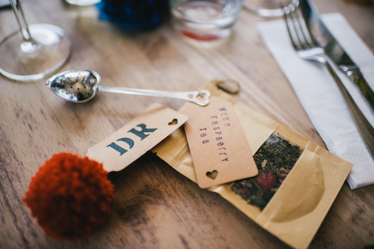 Pompom Place Setting Luggage Tag Tea Favours Alternative Home Made Colourful Wedding http://allisondeweyphotography.co.uk/