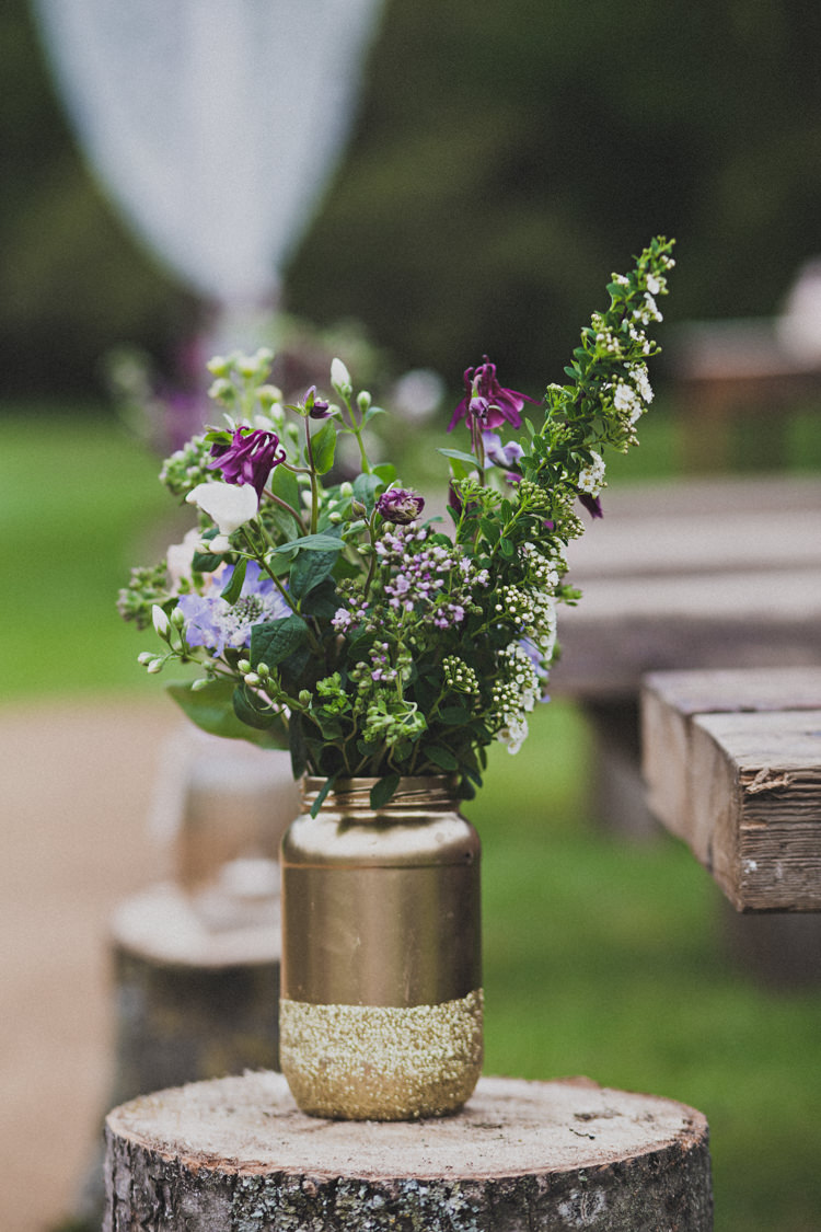Gold Jar Glitter Flowers Log Aisle Pew Decor Enchanting Free-Spirited Outdoor Wedding http://www.johnelphinstonestirling.com/