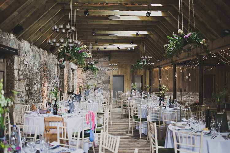 Barn Hanging Flowers Decor Enchanting Free-Spirited Outdoor Wedding http://www.johnelphinstonestirling.com/