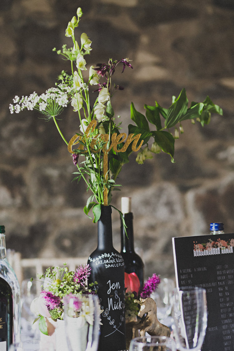 Chalk Black Painted Bottle Flowers Centrepieces Decor Table Enchanting Free-Spirited Outdoor Wedding http://www.johnelphinstonestirling.com/