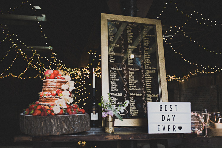Cake Naked Log Stand Frame Mirror Seating Plan Table Chart Enchanting Free-Spirited Outdoor Wedding http://www.johnelphinstonestirling.com/