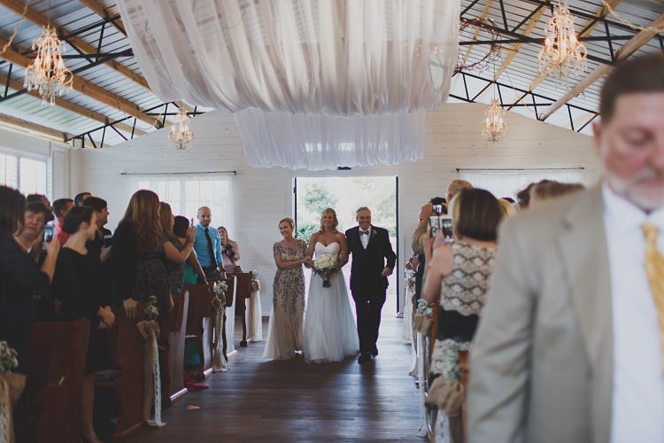 Bride Aisle Parents Glam Twinkling Ranch Wedding Florida https://www.stacypaulphotography.com/