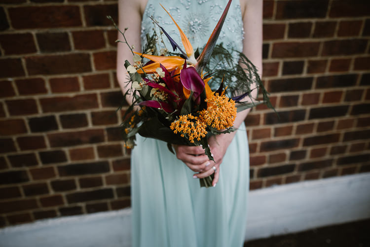 Bridesmaid Bouquet Flowers Orange Purple Tropical Bird Paradise Lily Laid Back Local London Lido Wedding http://andrewbrannanphotography.co.uk/
