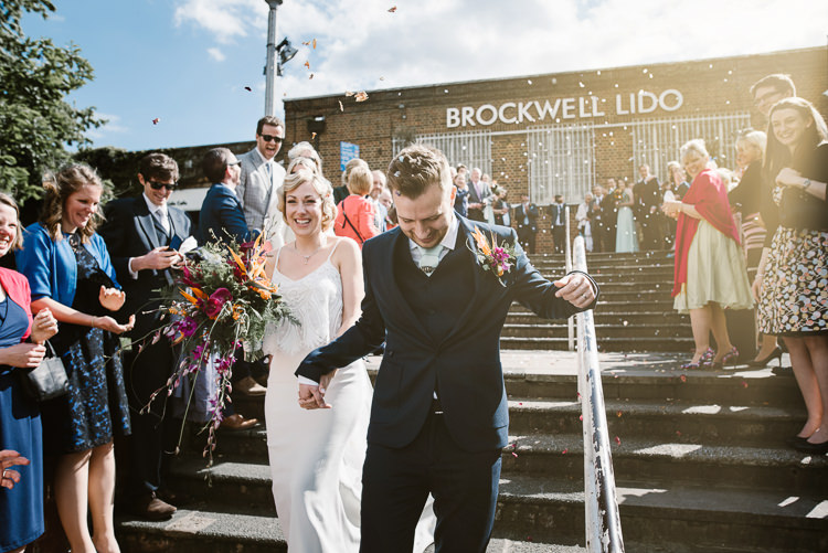 Confetti Throw Bride Groom Married Laid Back Local London Lido Wedding http://andrewbrannanphotography.co.uk/