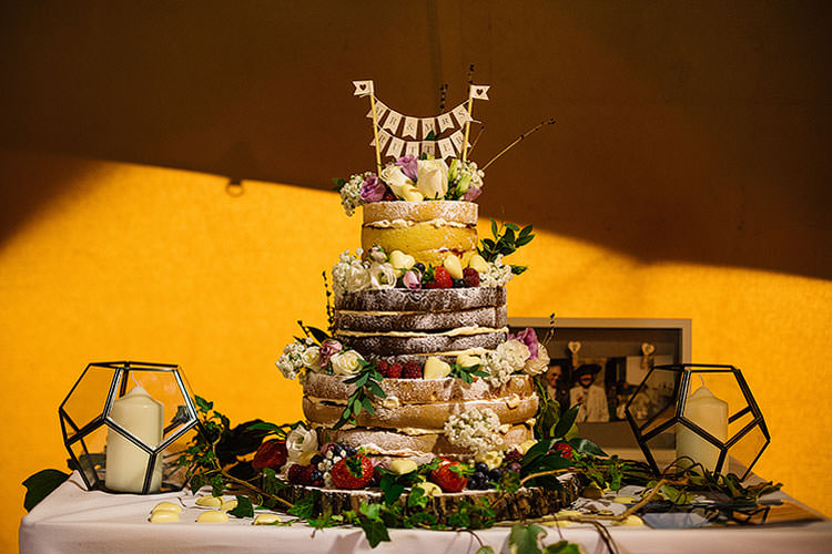 Naked Sponge Cake Layer Bunting Topper Charming Natural Countryside Tipi Wedding http://www.pauljosephphotography.co.uk/