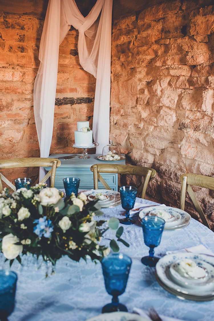 Table Decoration Glassware Blue Windy Valley of Fire Wedding Nevada https://cactusandlaceweddings.com/