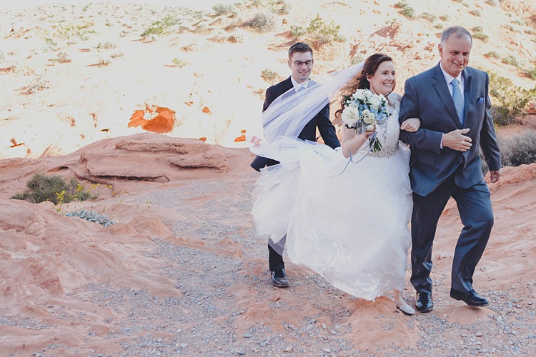 Bride Aisle Windy Valley of Fire Wedding Nevada https://cactusandlaceweddings.com/