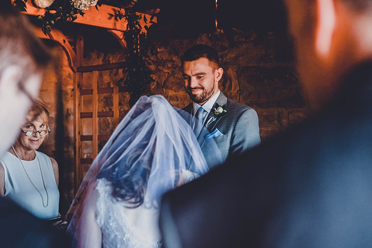 Groom Ceremony Windy Valley of Fire Wedding Nevada https://cactusandlaceweddings.com/