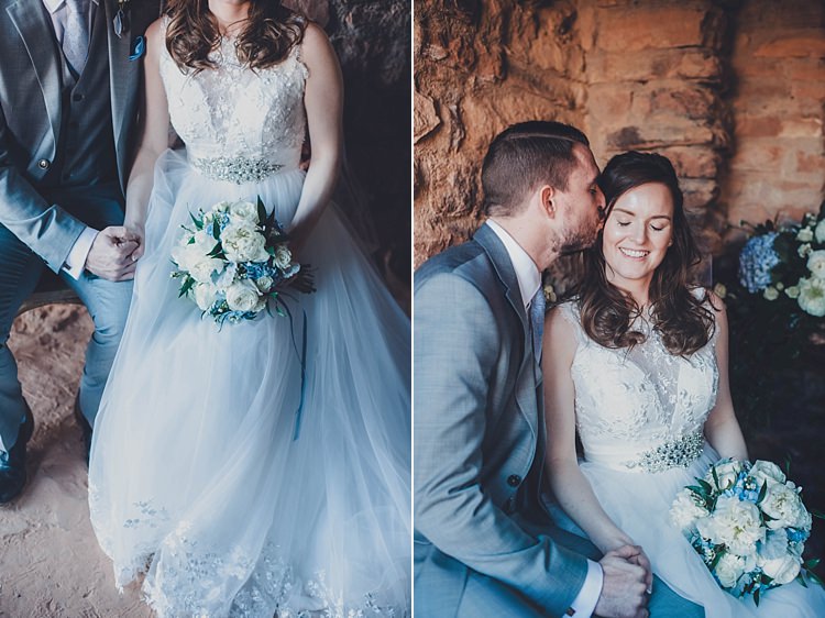 Bride Groom Kiss Windy Valley of Fire Wedding Nevada https://cactusandlaceweddings.com/
