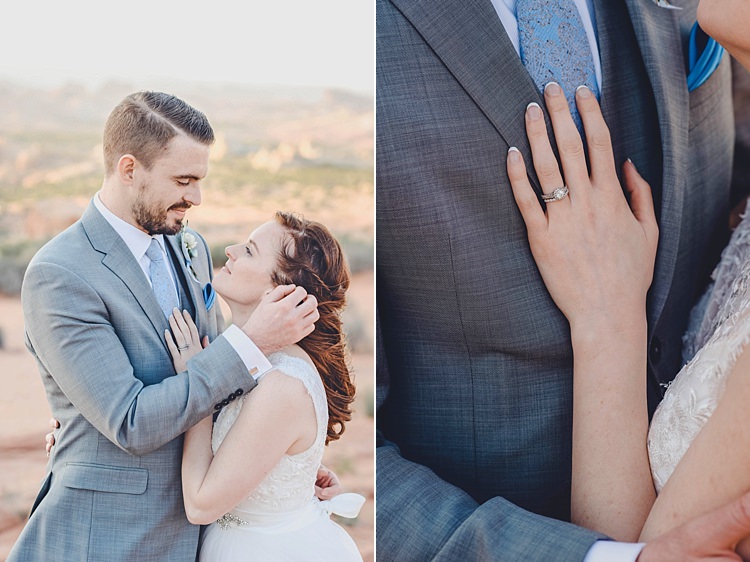 Bride Groom Embrace Windy Valley of Fire Wedding Nevada https://cactusandlaceweddings.com/