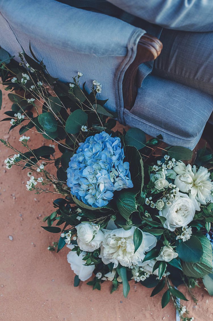Blue Chair Hydrangeas Windy Valley of Fire Wedding Nevada https://cactusandlaceweddings.com/