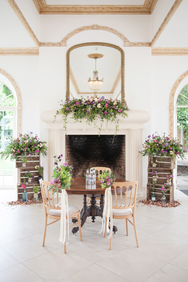 Ceremony Flowers Crates Chairs Table Fireplace Mantle Summer Festival Country Estate Wedding http://kerryannduffy.com/