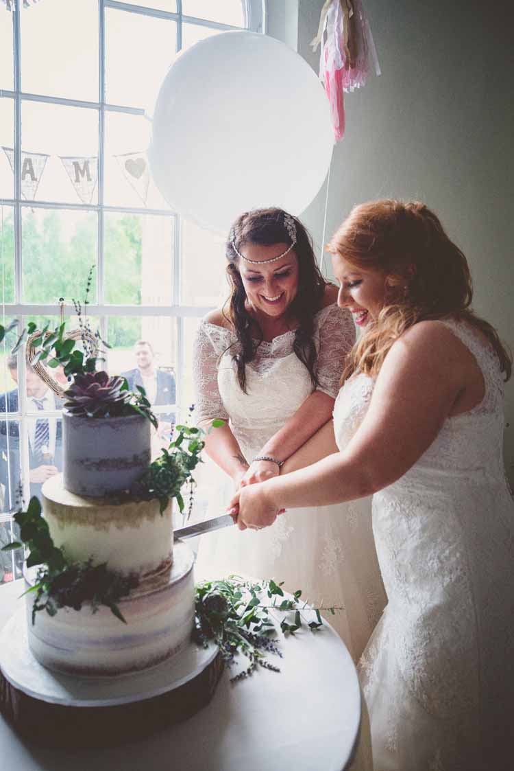Cake Cutting Table Semi Half Naked Lavender Foliage Succulents Ivy Brides Bridal A Line Sweetheart Bouquet Trailing sleeves Champagne Lace Hairpiece Eclectic Floral Fun Wedding http://www.photographybypaloma.co.uk/