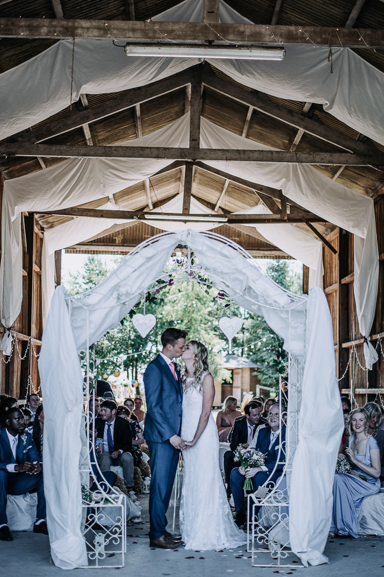 Arch Backdrop Ceremony Fabric Drapes Rustic Farm Barn DIY Wedding http://www.kazooieloki.co.uk/