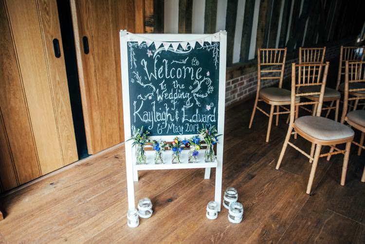 Chalk Black Board Welcome Sign Colourful Hand Made Rustic Barn Flower Filled Wedding http://www.threeflowersphotography.co.uk/