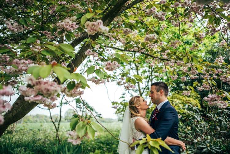 Cherry Blossom Portraits Colourful Hand Made Rustic Barn Flower Filled Wedding http://www.threeflowersphotography.co.uk/