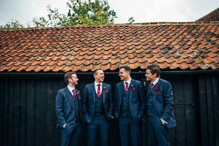 Navy Blue Suits Red Ties Groomsmen Colourful Hand Made Rustic Barn Flower Filled Wedding http://www.threeflowersphotography.co.uk/