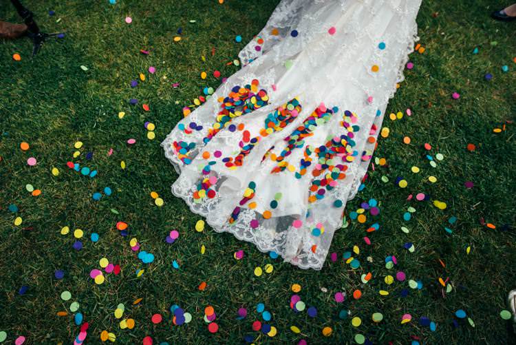 Hand Stamped Confetti Circles Colourful Hand Made Rustic Barn Flower Filled Wedding http://www.threeflowersphotography.co.uk/