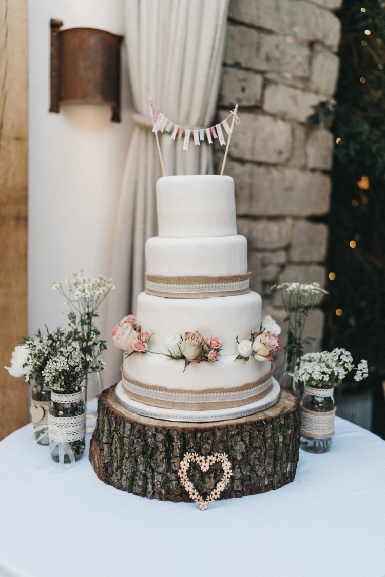 Hessian Lace Cake Bunting Log Stand Flowers Eclectic Cool Glam Barn Wedding http://luciusfoxphotography.com/ http://www.stevebridgwoodphotography.co.uk/