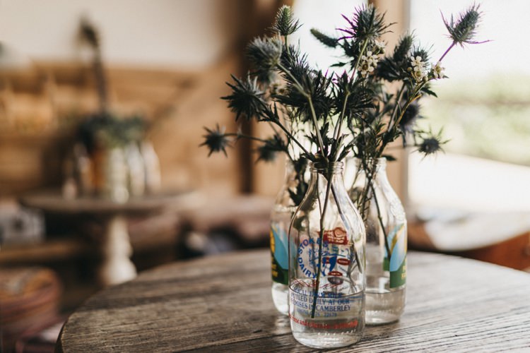 Vintage Milk Bottle Flowers Eclectic Cool Glam Barn Wedding http://luciusfoxphotography.com/ http://www.stevebridgwoodphotography.co.uk/