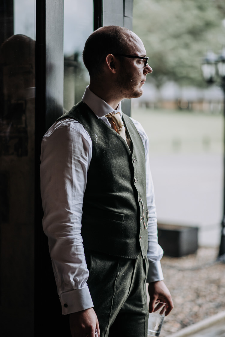 Green Suit Yellow Tie Waistcoat Groom DIY Outdoor Tipi Vineyard Wedding http://www.kazooieloki.co.uk/