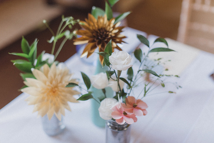 Paper Flowers DIY Bottles Centrepiece Relaxed Home Made Love Barn Wedding http://www.rebeccadouglas.co.uk/