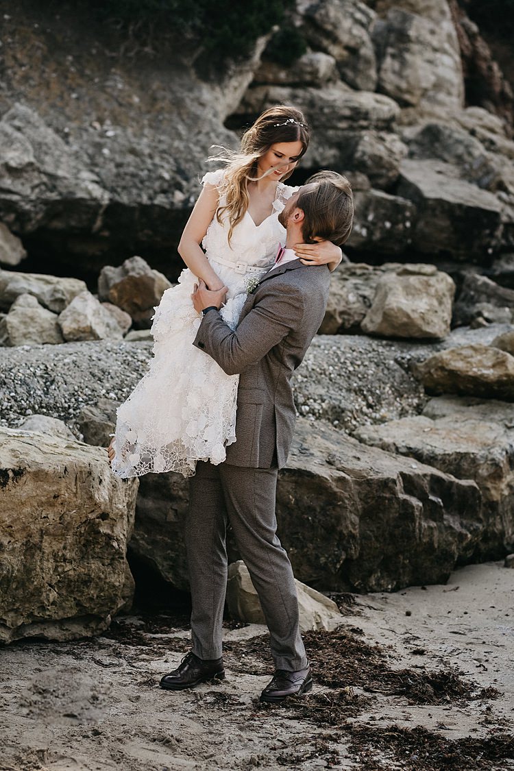 Bride Lift Groom Beach Rocks Whimsical Greenery Wedding Ideas Sea http://eglejo.lt/