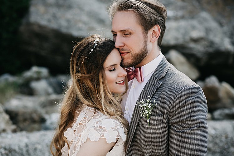 Bride Groom Embrace Beach Rocks Whimsical Greenery Wedding Ideas Sea http://eglejo.lt/