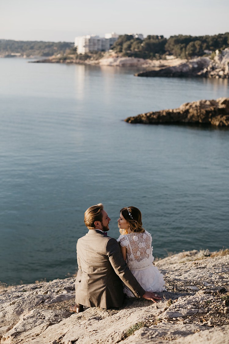 Bride Groom Beach Cliff Sitting Whimsical Greenery Wedding Ideas Sea http://eglejo.lt/