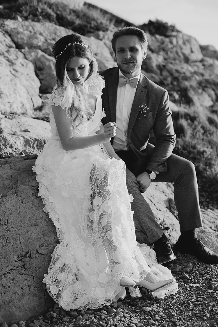 Bride Groom Sitting Cliff Whimsical Greenery Wedding Ideas Sea http://eglejo.lt/