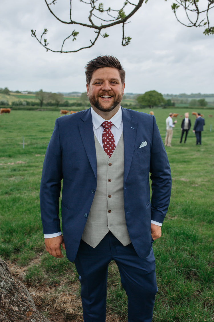 Bespoke Groom Navy Suit Grey Waistcoat Red Tie Outdoor Farm Wedding 1970s Dress https://www.magdak.co.uk/