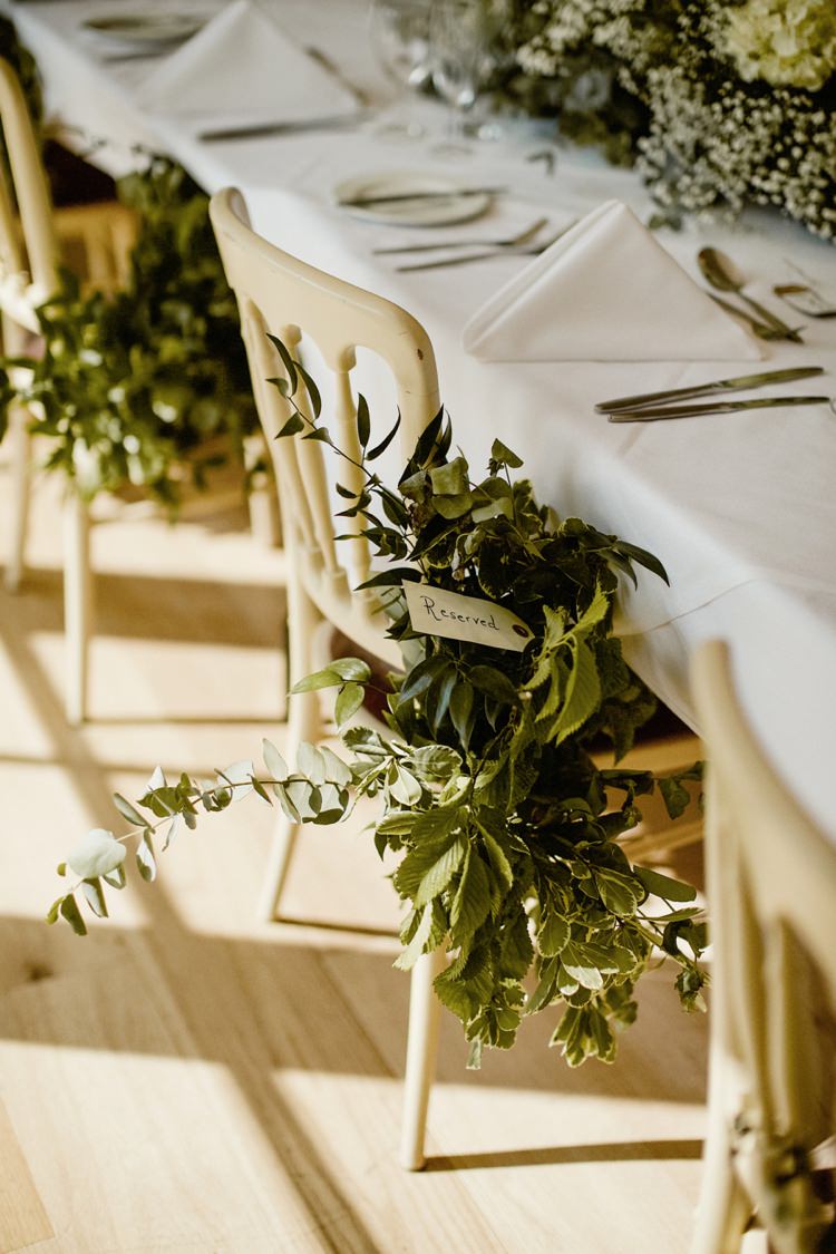 Chair Flowers Foliage Decor Nostalgic Playful Greenery Floral Garden Wedding http://jesspetrie.com/ 
