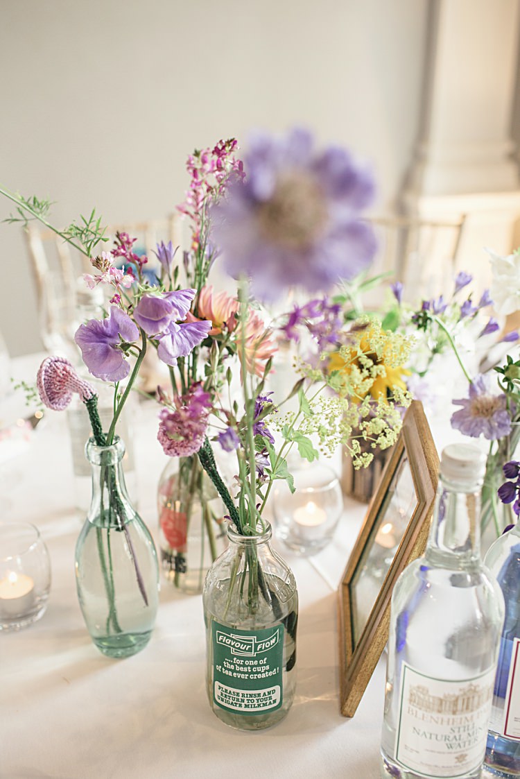 Wild Flowers Bottles Centrepiece Colourful Home Made Vintage City Wedding http://kat-hill.com/