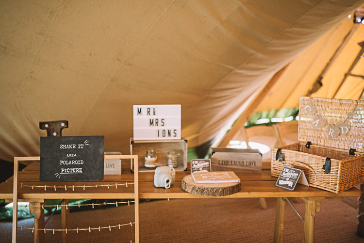 Polariod Guest Book Table Rustic Boho Summer Tipi Wedding https://www.luciewatsonphotography.com/