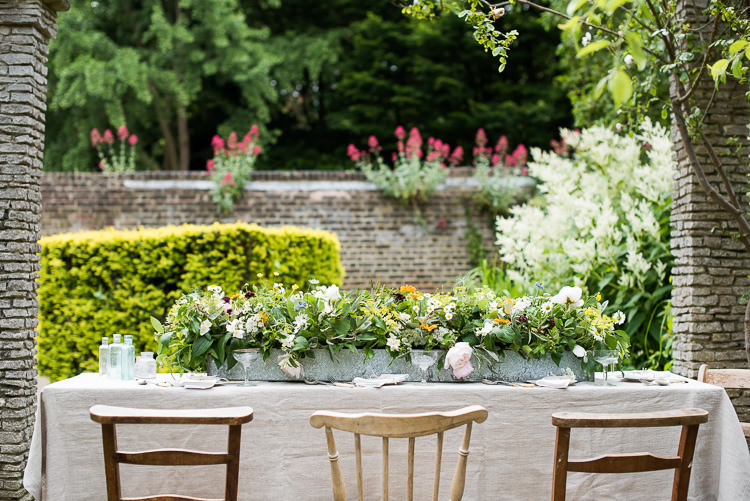 Mismatched Wooden Chairs Galvanised Metal Steel Trough Flowers Table Setting Pretty Urban Nature Wedding Ideas http://www.fionasweddingphotography.co.uk/