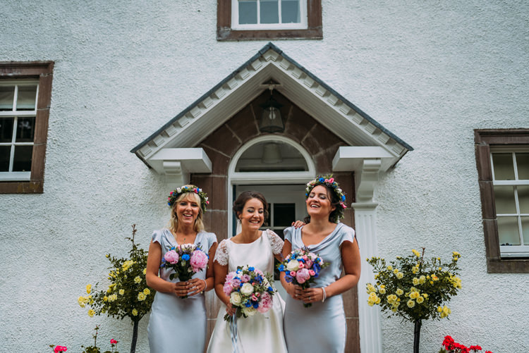 Grey Bridesmaid Dresses Flower Crowns Enchanting Cornflower Blue Marquee Wedding https://burfly.co.uk/