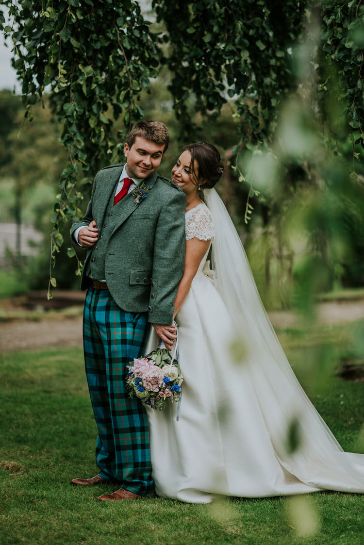 Tartan Trousers Groom Tweed Jacket Enchanting Cornflower Blue Marquee Wedding https://burfly.co.uk/