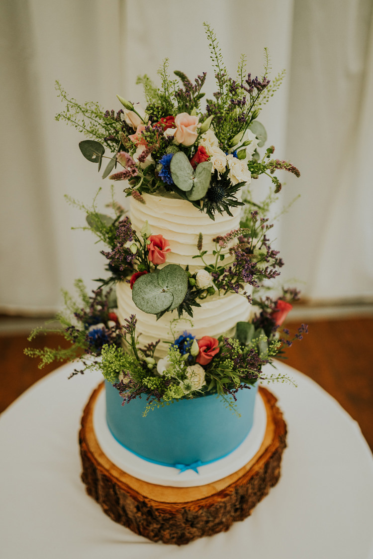 Buttercream Cake Rustic Log Stand Flowers Enchanting Cornflower Blue Marquee Wedding https://burfly.co.uk/