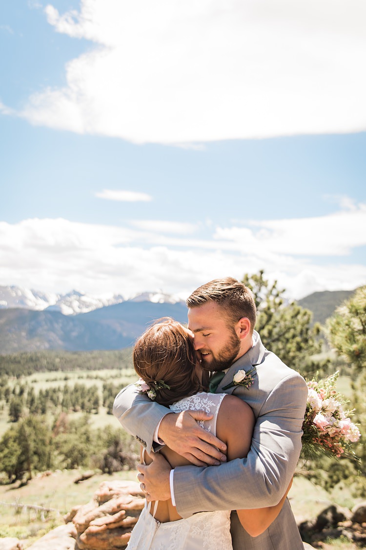 Bride Groom Embrace Scenic Rocky Mountain National Park Elopement http://allisonslaterphotography.com/