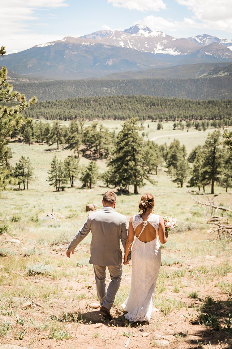 Key Hole Dress Holding Hands Scenic Rocky Mountain National Park Elopement http://allisonslaterphotography.com/