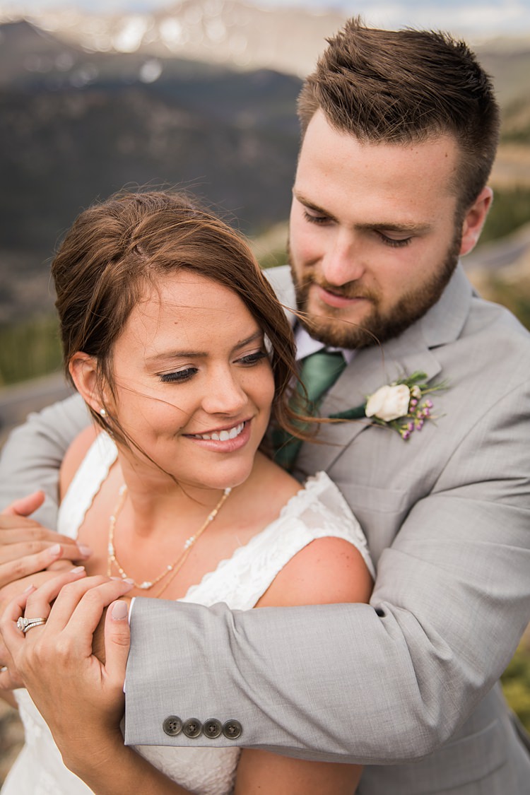 Bride Groom Embrace Scenic Rocky Mountain National Park Elopement http://allisonslaterphotography.com/
