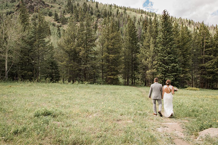 Bride Groom Walking Trees Scenic Rocky Mountain National Park Elopement http://allisonslaterphotography.com/