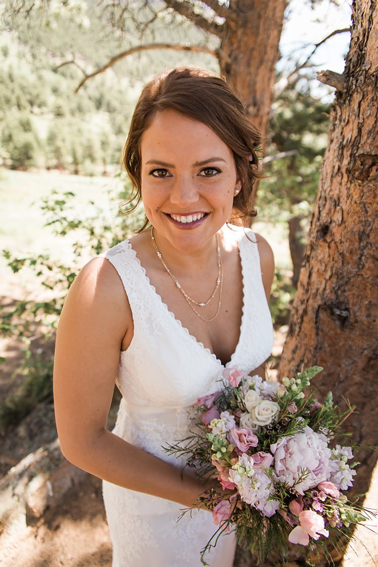Bride Smiling Bouquet Scenic Rocky Mountain National Park Elopement http://allisonslaterphotography.com/