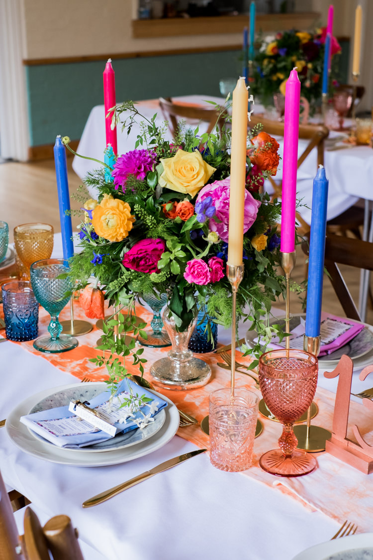 Decor Tablescape Table Centrepiece Tie Die Colourful Flowers Candles Whimsical Unicorn Rainbow Wedding http://clairemacintyre.com/
